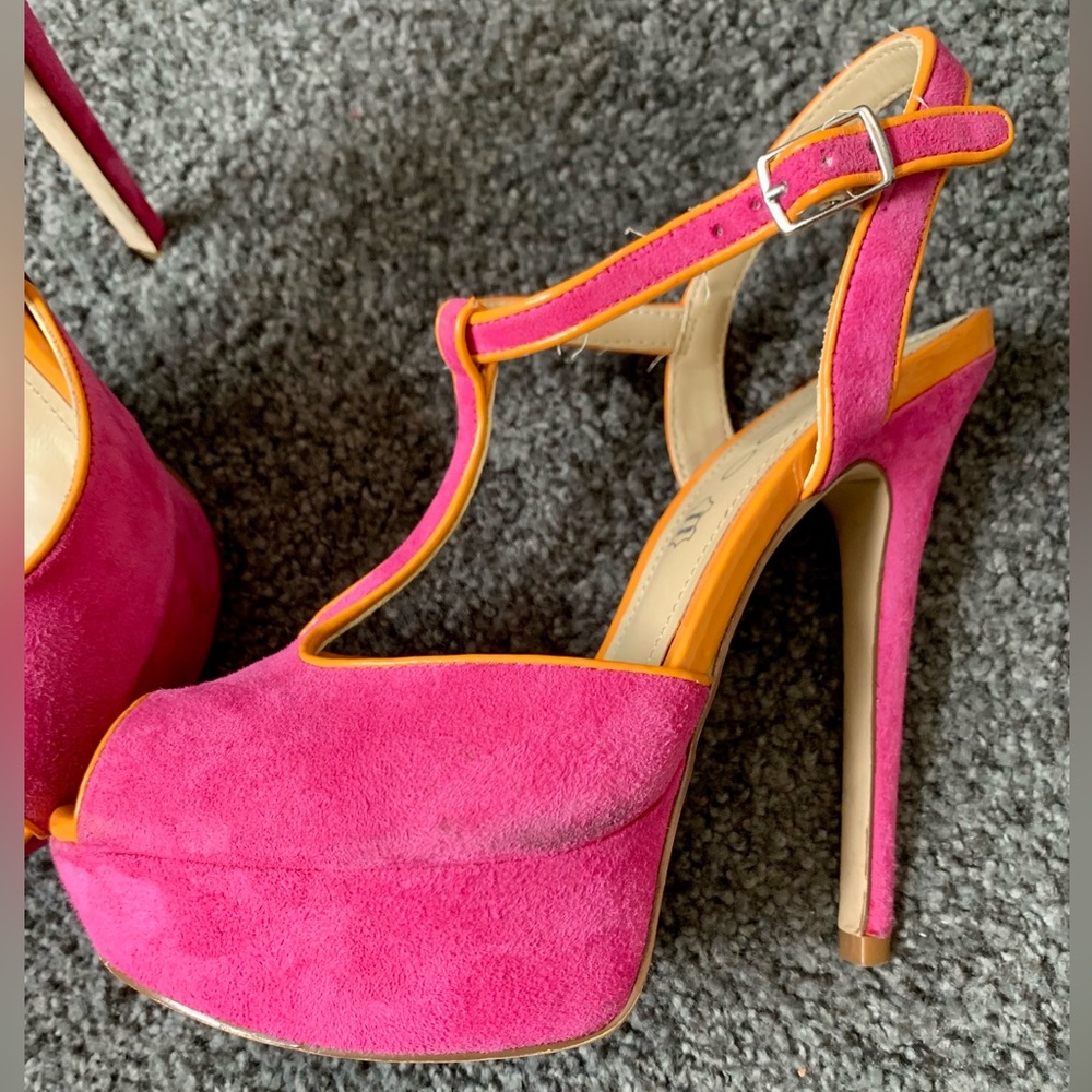 Pink high heels.